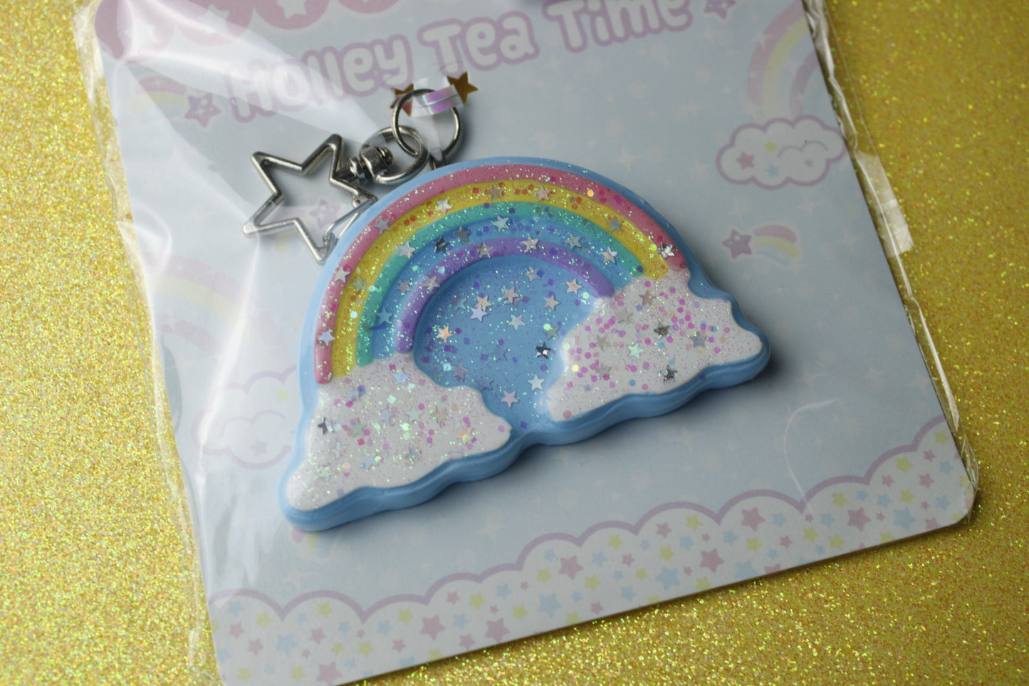 Rainbow in the clouds glitter star keychain